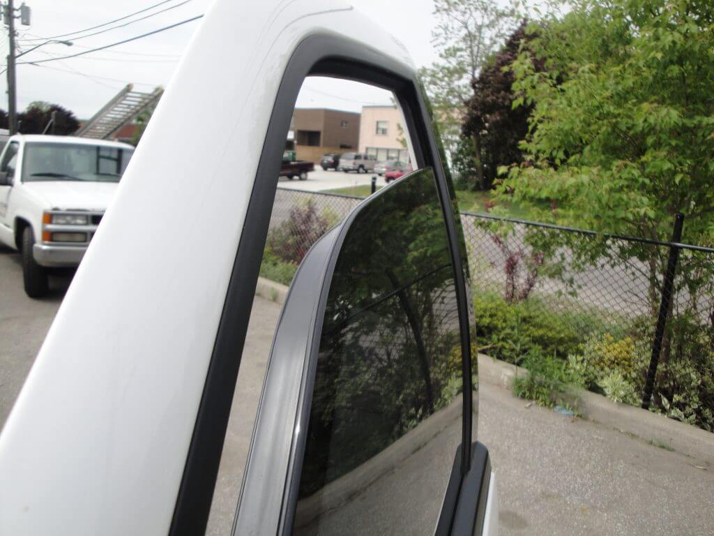 TAG Picture of bulletproof glass in a Ford Expedition SUV